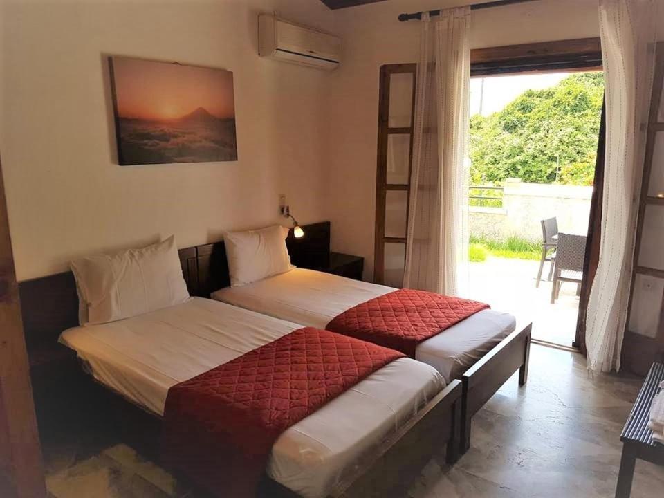 Amalia Cottages Agios Gordios  Buitenkant foto